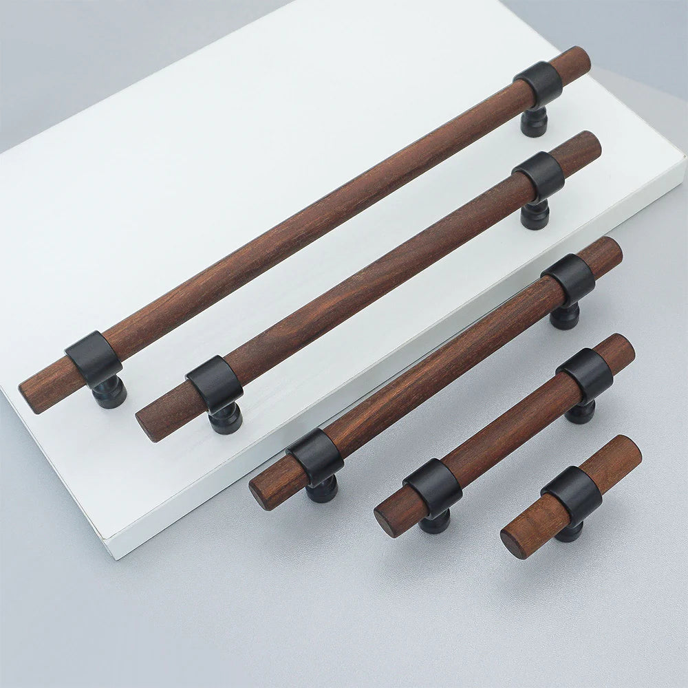Walnut drawer handles in various lengths.