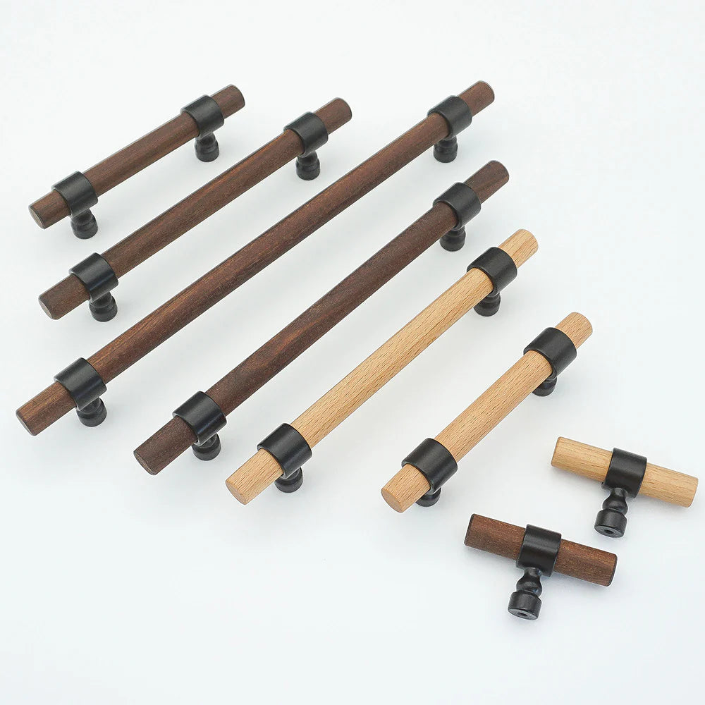 Assorted walnut wood drawer handles in various sizes with black brackets.