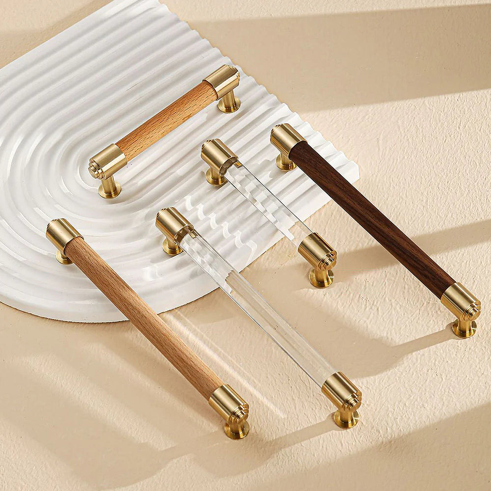 Brass and crystal cabinet handles with walnut, beech, and clear crystal design.