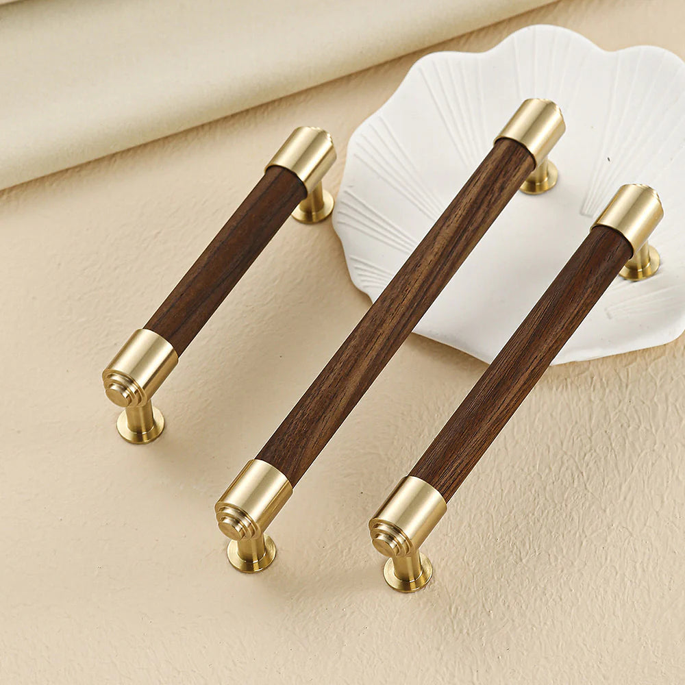 Decorative brass and crystal cabinet handles in dark walnut finish.