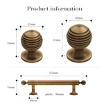 Brass cabinet knobs and pull with dimensions on a white background