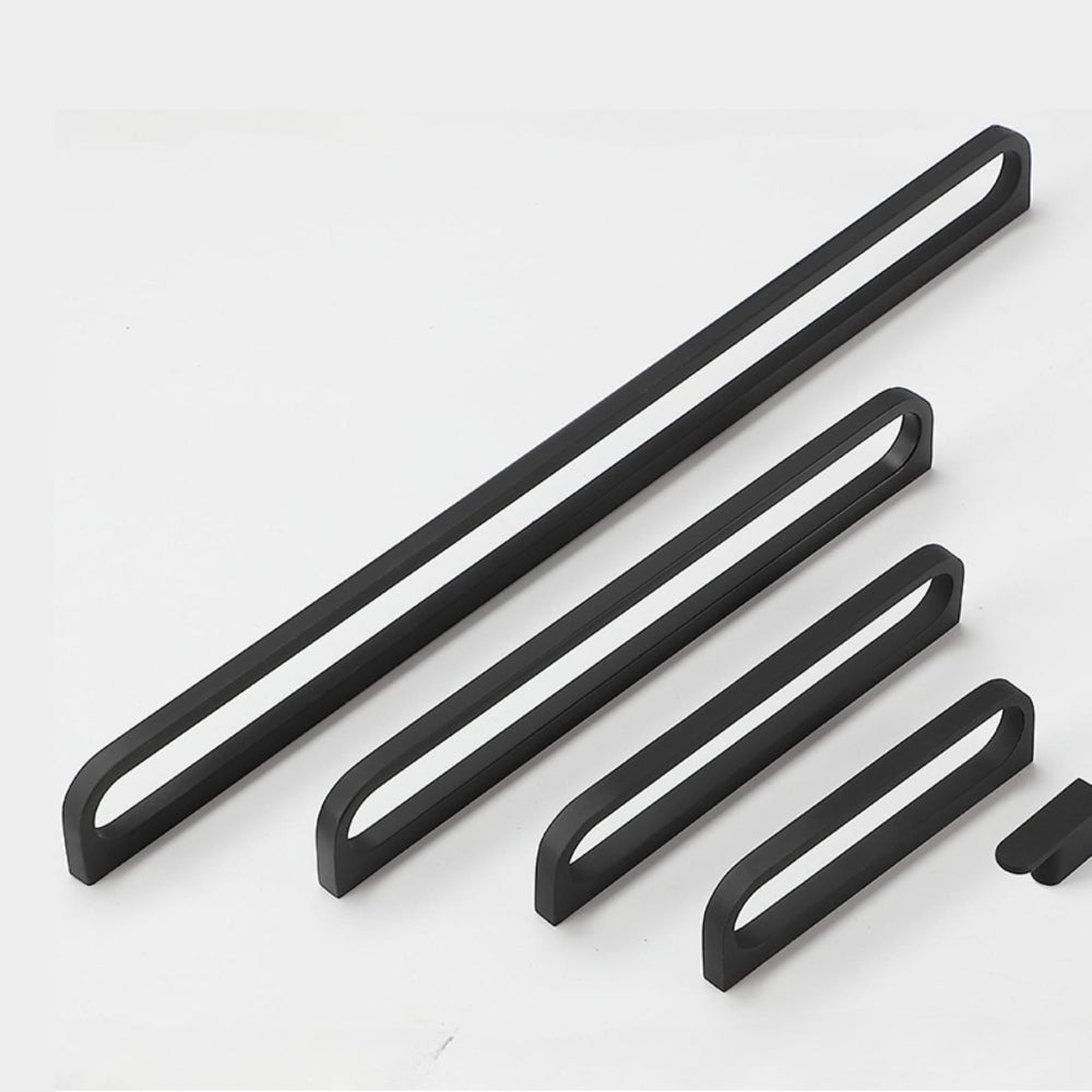 Set of black metal handles on a white background